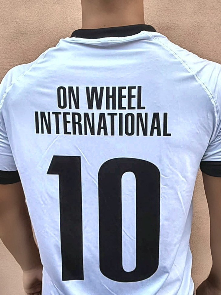 White custom match jersey with number 10, made by On Wheel International
